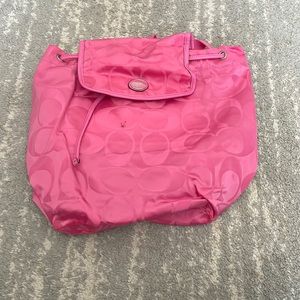 Foldable pink Coach backpack